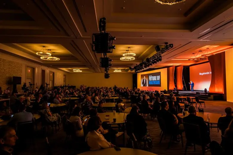 Nicholas Webb speaking at a healthcare event
